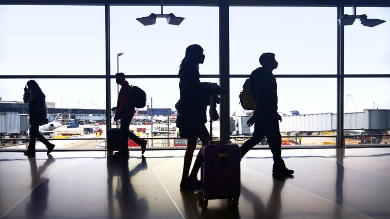 Travelers are pictured at O'Hare International Airport in 2020. (Donte Tatum / iStock)
